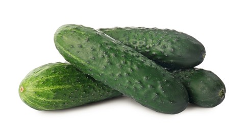 Photo of Whole fresh green cucumbers on white background