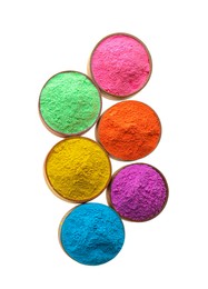 Colorful powders in bowls on white background, top view. Holi festival celebration