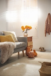 Photo of Cozy living room interior inspired by autumn colors