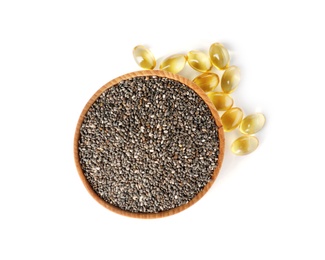 Bowl of seeds and capsules with chia oil on white background, top view