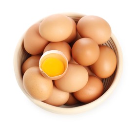 Photo of Chicken eggs in bowl isolated on white, above view