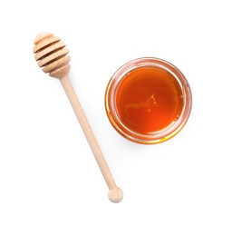 Tasty natural honey, glass jar and dipper on white background, top view