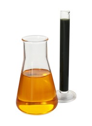 Photo of Test tube and flask with different types of oil isolated on white