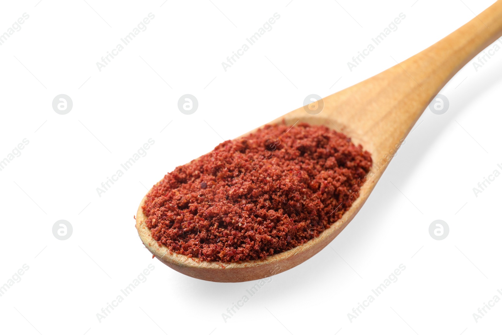 Photo of Dried cranberry powder in wooden spoon isolated on white