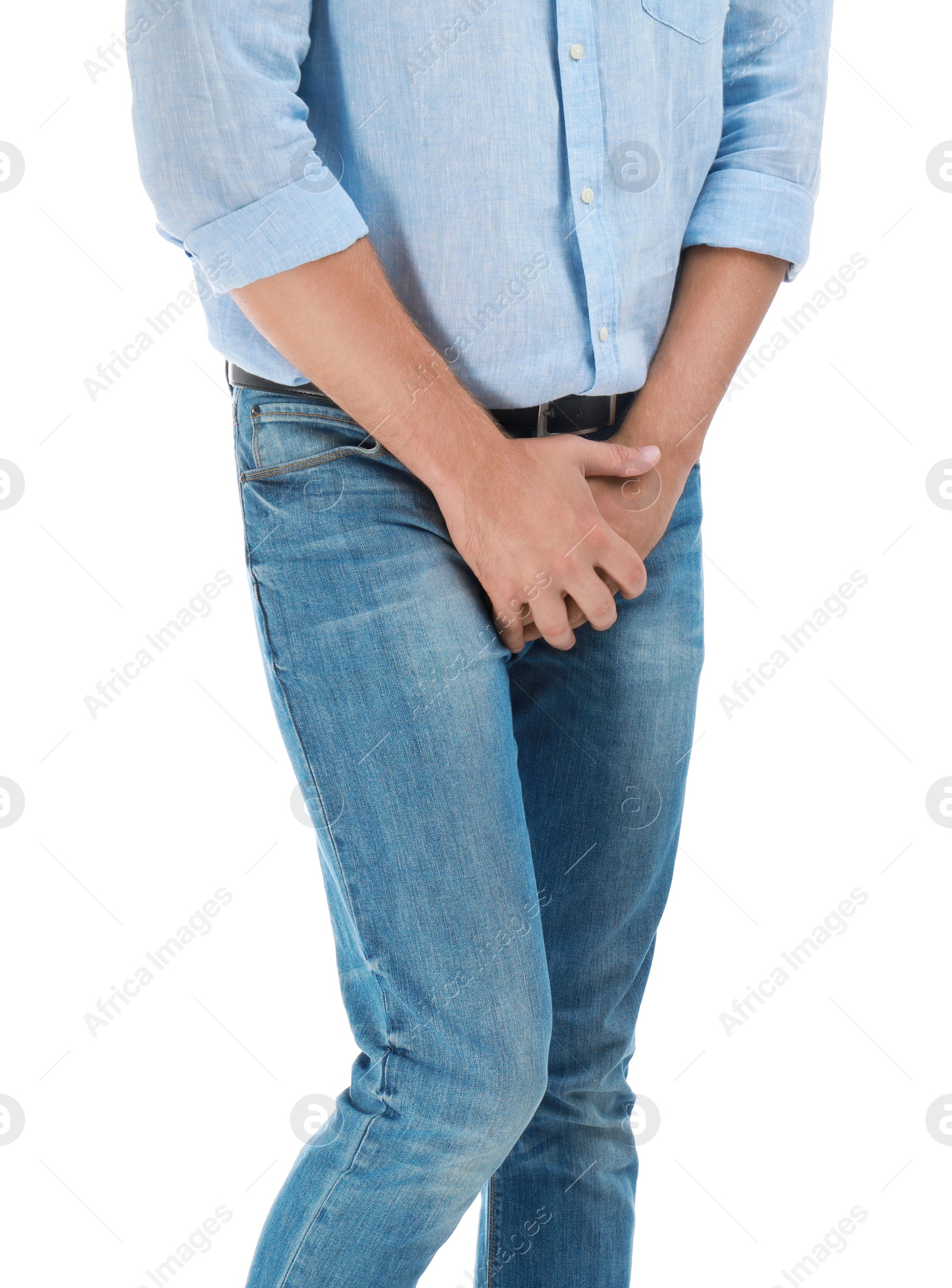 Photo of Man suffering from pain on white background, closeup. Urology problems