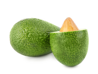 Tasty ripe avocados on white background. Tropical fruit