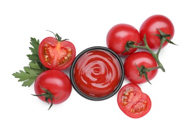 Photo of Bowl with tasty ketchup, parsley and fresh tomatoes isolated on white, top view
