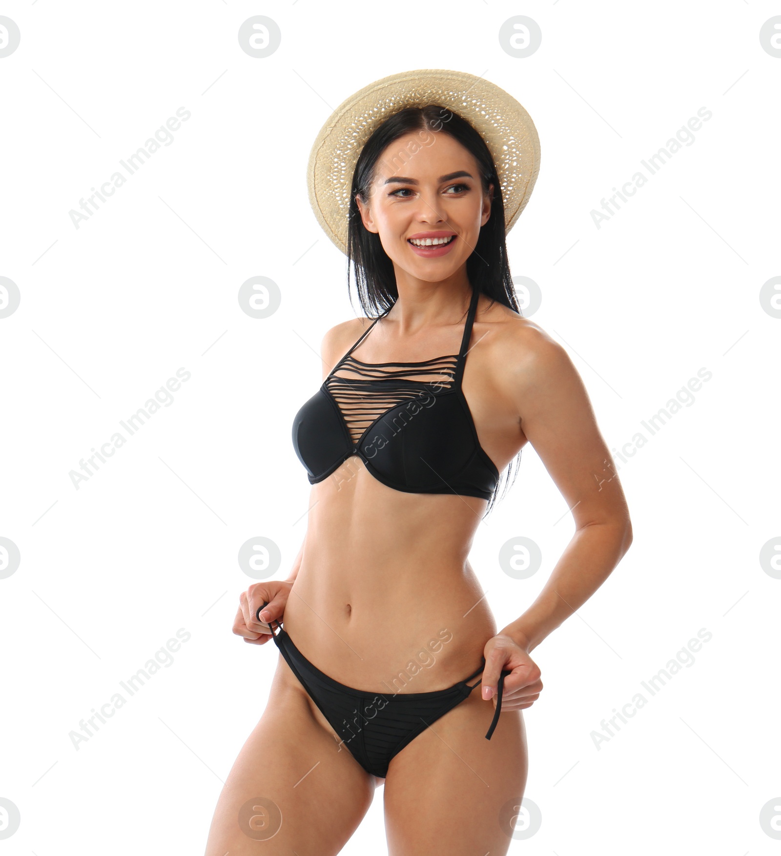 Photo of Beautiful young woman in black bikini with hat on white background