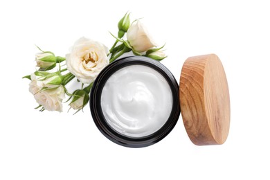 Photo of Jar of hand cream and roses on white background, top view