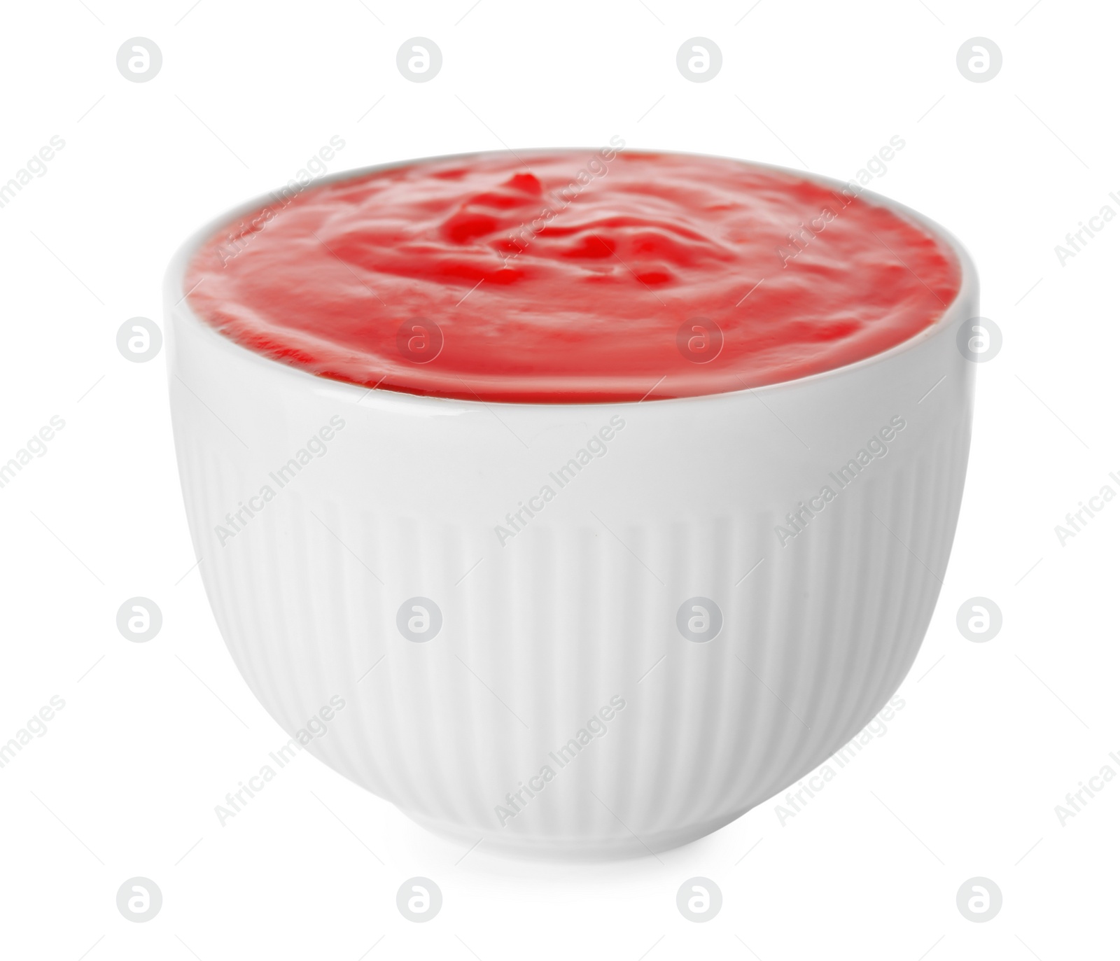 Photo of Bowl with red sauce isolated on white