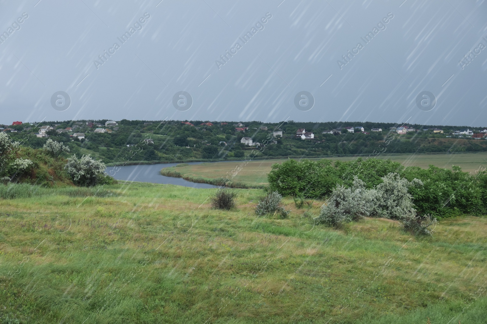 Photo of Beautiful view of river on grey day. Rainy weather