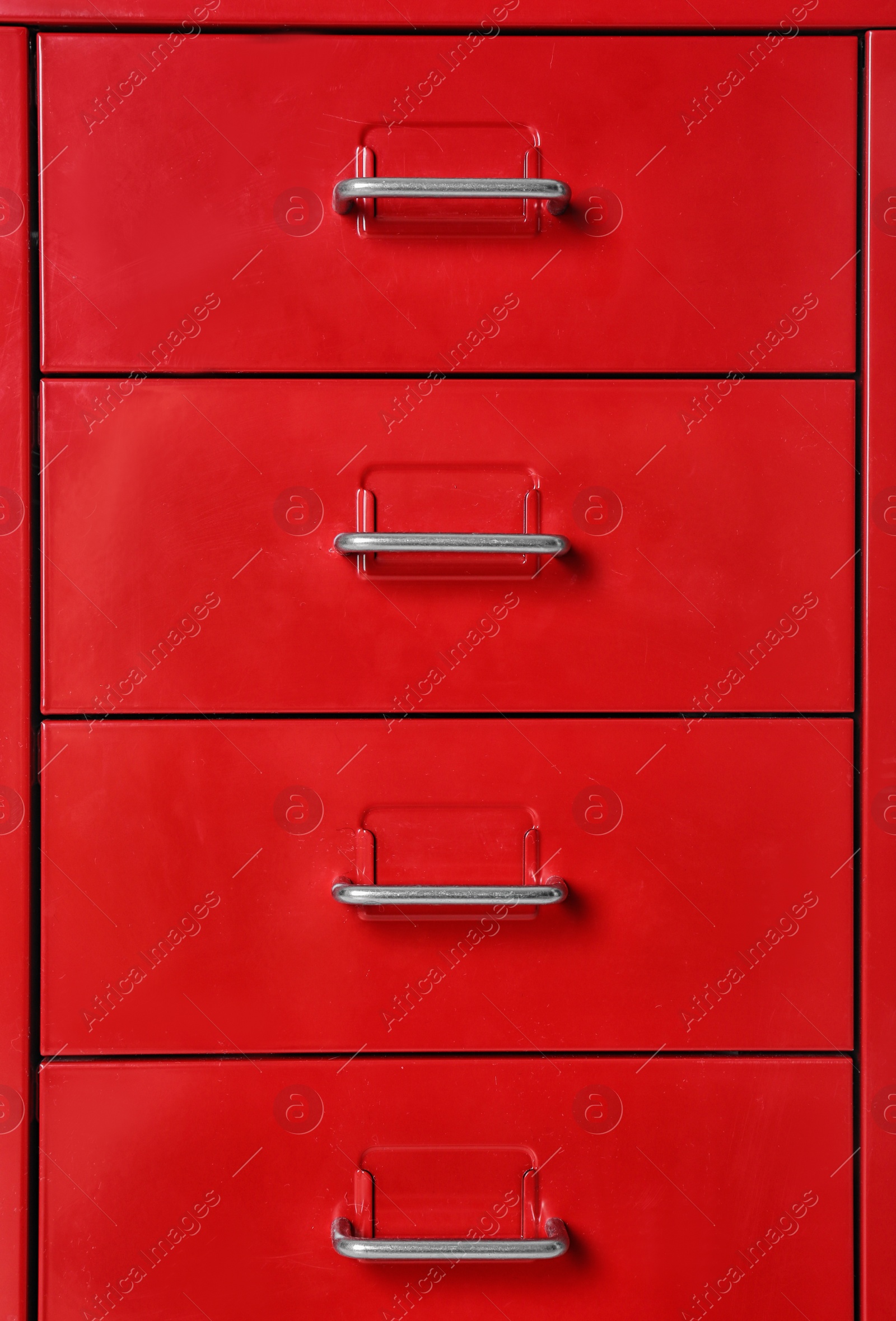 Photo of Red wardrobe drawers as background, closeup view