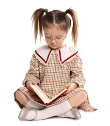 Photo of Cute little girl reading book on white background