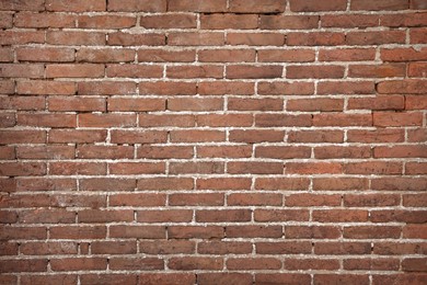 Photo of Texture of old red brick wall as background