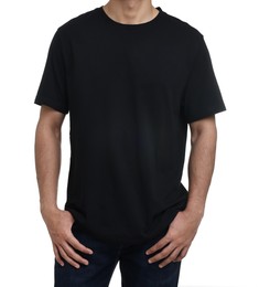 Man in black t-shirt on white background, closeup