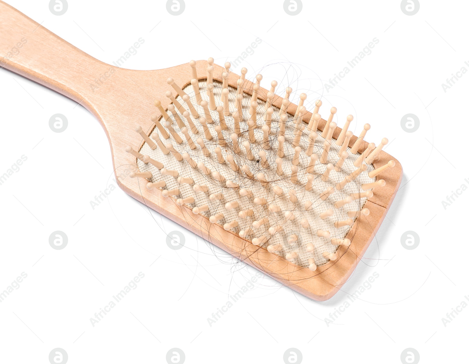 Photo of Wooden brush with lost hair isolated on white, above view