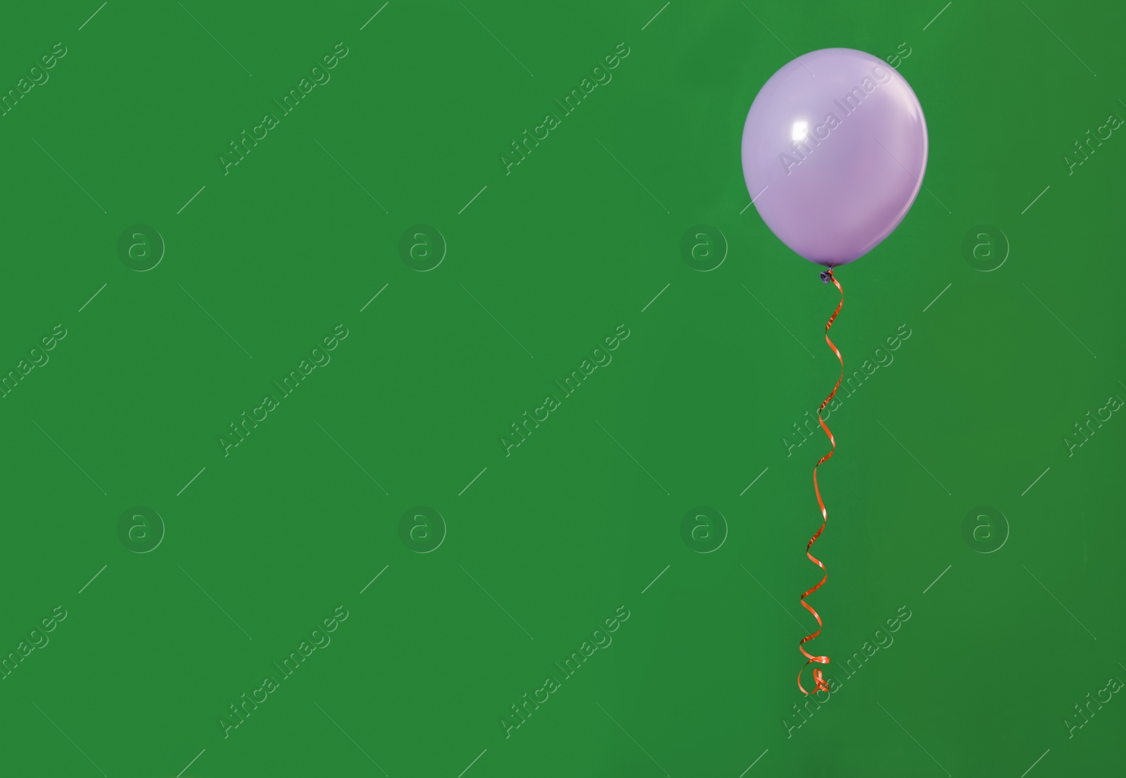 Photo of Bright balloon on color background, space for text. Celebration time