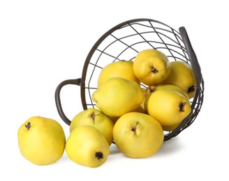 Photo of Basket with delicious fresh ripe quinces isolated on white