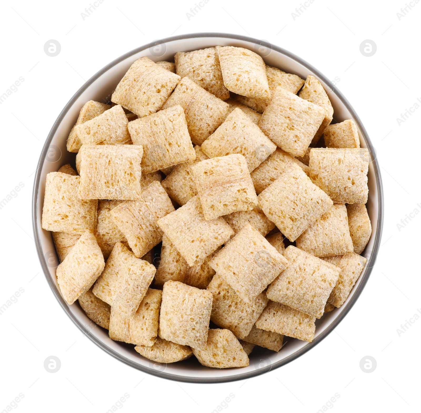 Photo of Bowl of delicious corn pads isolated on white, top view