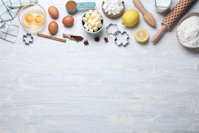 Photo of Cooking utensils and ingredients on white wooden table, flat lay. Space for text