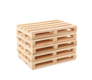 Photo of Stack of small wooden pallets on white background