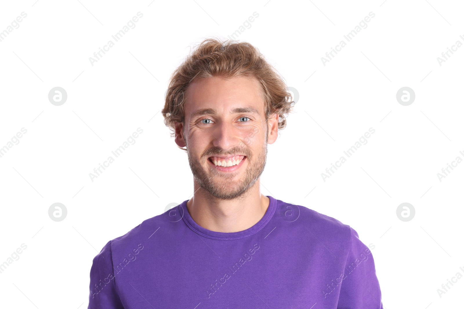 Photo of Handsome young man laughing on white background