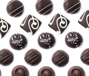 Image of Set with different chocolate candies on white background, top view