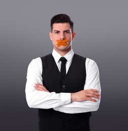 Man with taped mouth on grey background. Speech censorship