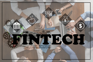 Fintech concept. Business people working at table, top view