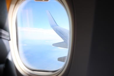 Beautiful view through plane window during flight. Air travel