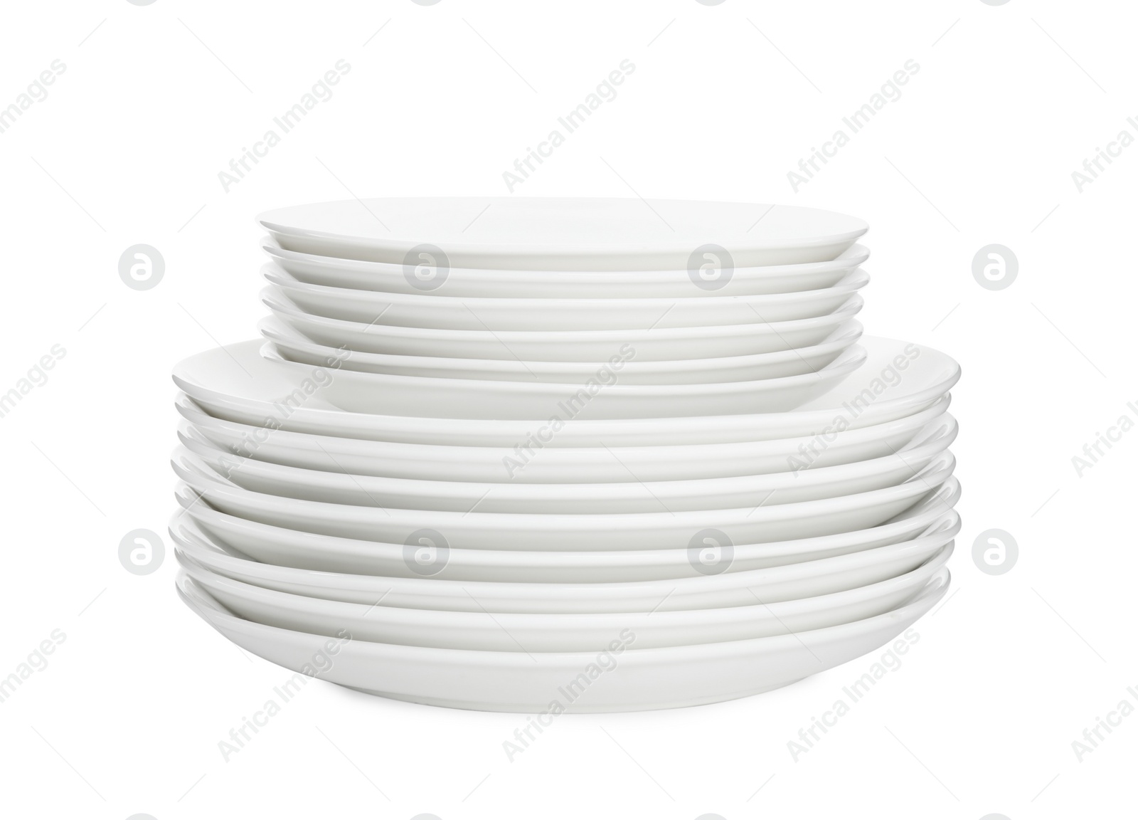 Photo of Stack of clean plates on white background