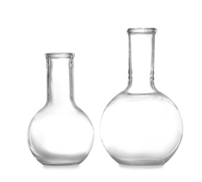 Photo of Empty Florence flasks on white background. Chemistry glassware