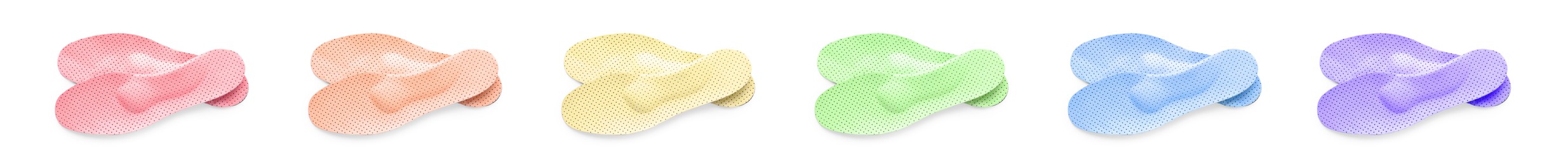 Image of Set with colorful orthopedic insoles on white background, top view. Banner design