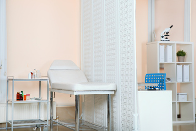 Photo of Modern interior of doctor's office with couch