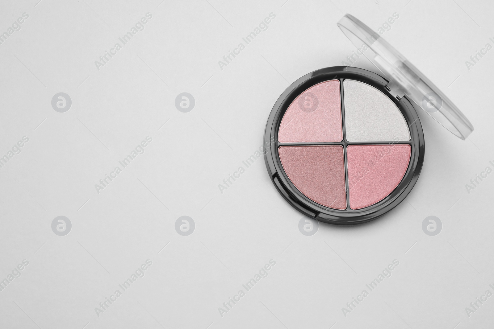 Photo of Colorful contouring palette on light grey background, top view with space for text. Professional cosmetic product