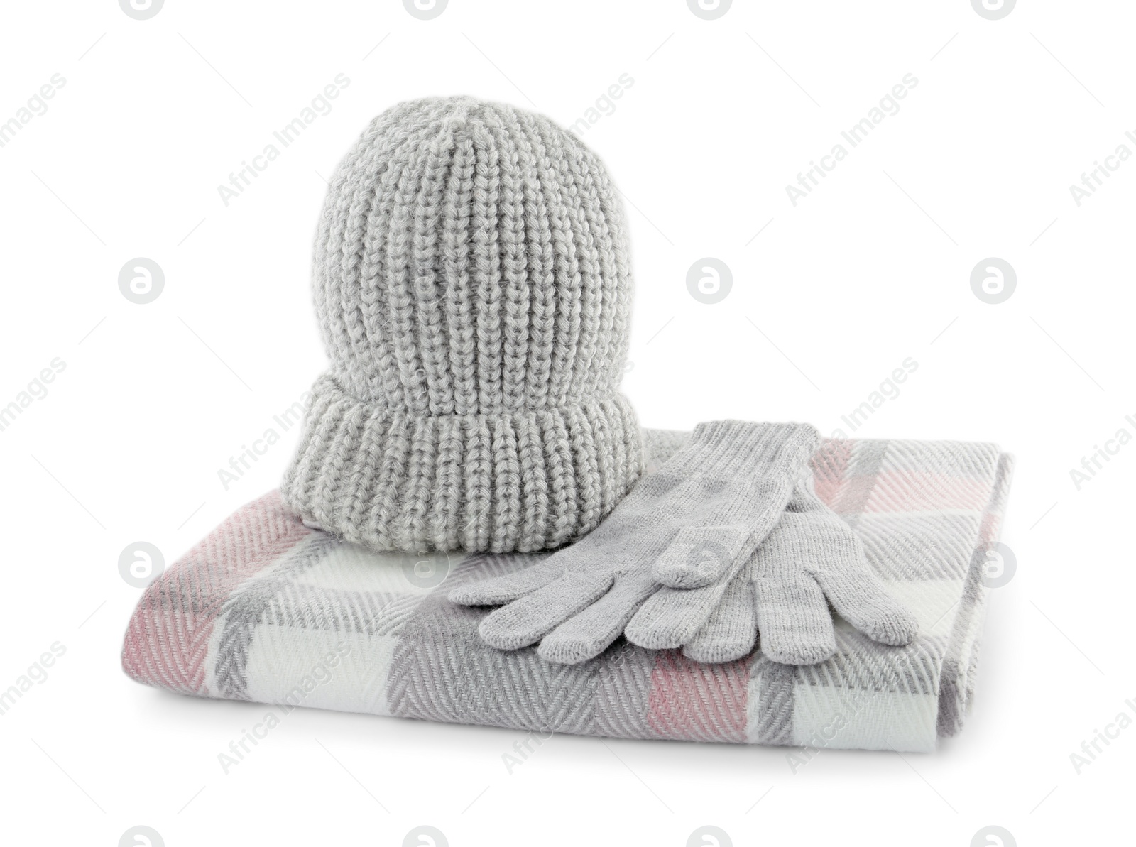 Photo of Woolen gloves, hat and scarf on white background. Winter clothes