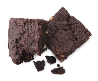 Photo of Delicious chocolate brownies with nuts on white background, top view