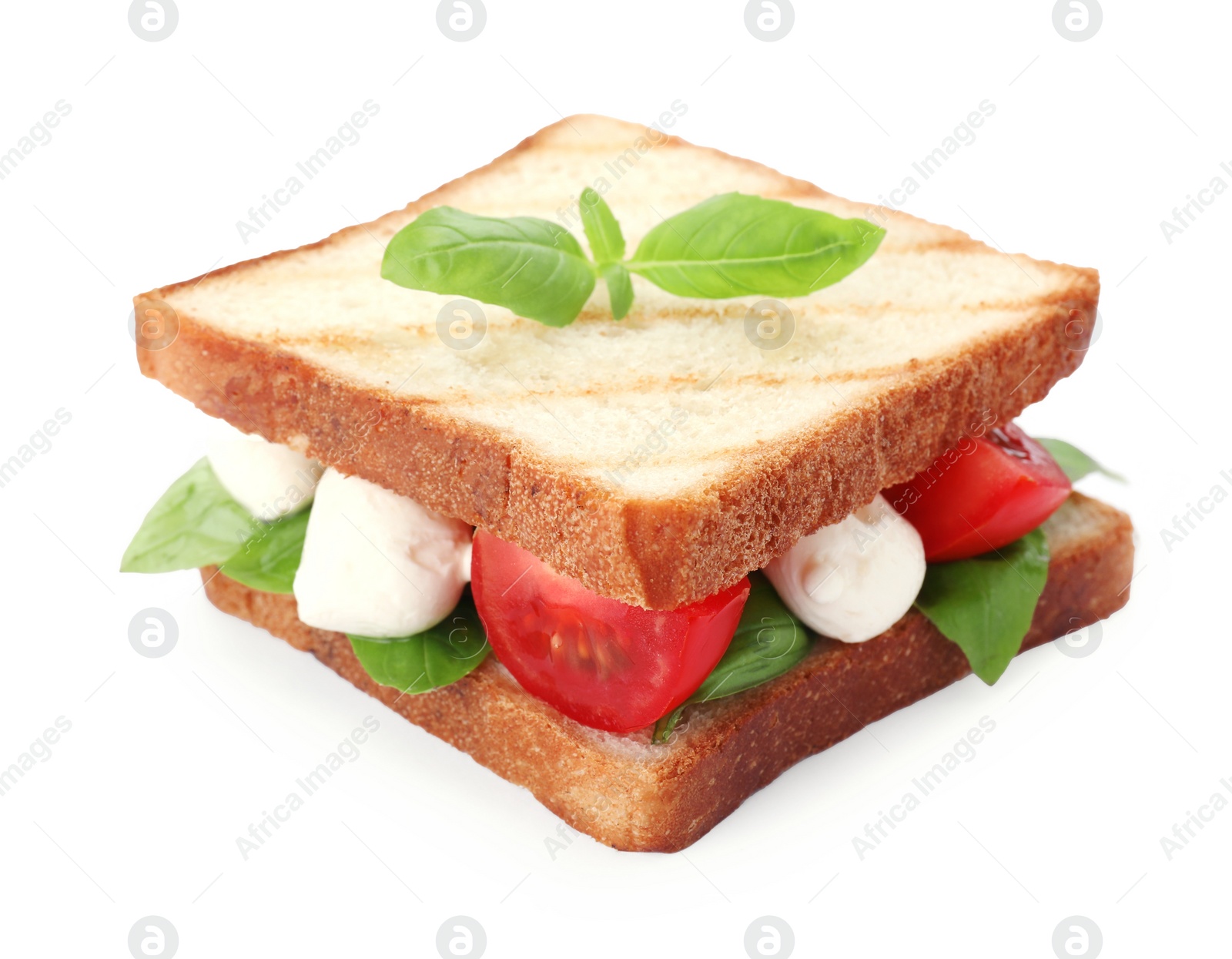 Photo of Delicious Caprese sandwich with mozzarella, tomatoes, basil and pesto sauce isolated on white