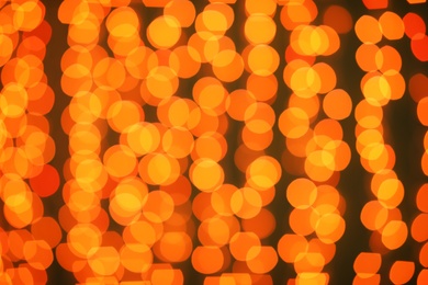 Beautiful gold lights on dark background. Bokeh effect