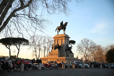 Photo of Rome, Italy - February 4, 2024 : Garibaldi monument and parked vehicles outdoors