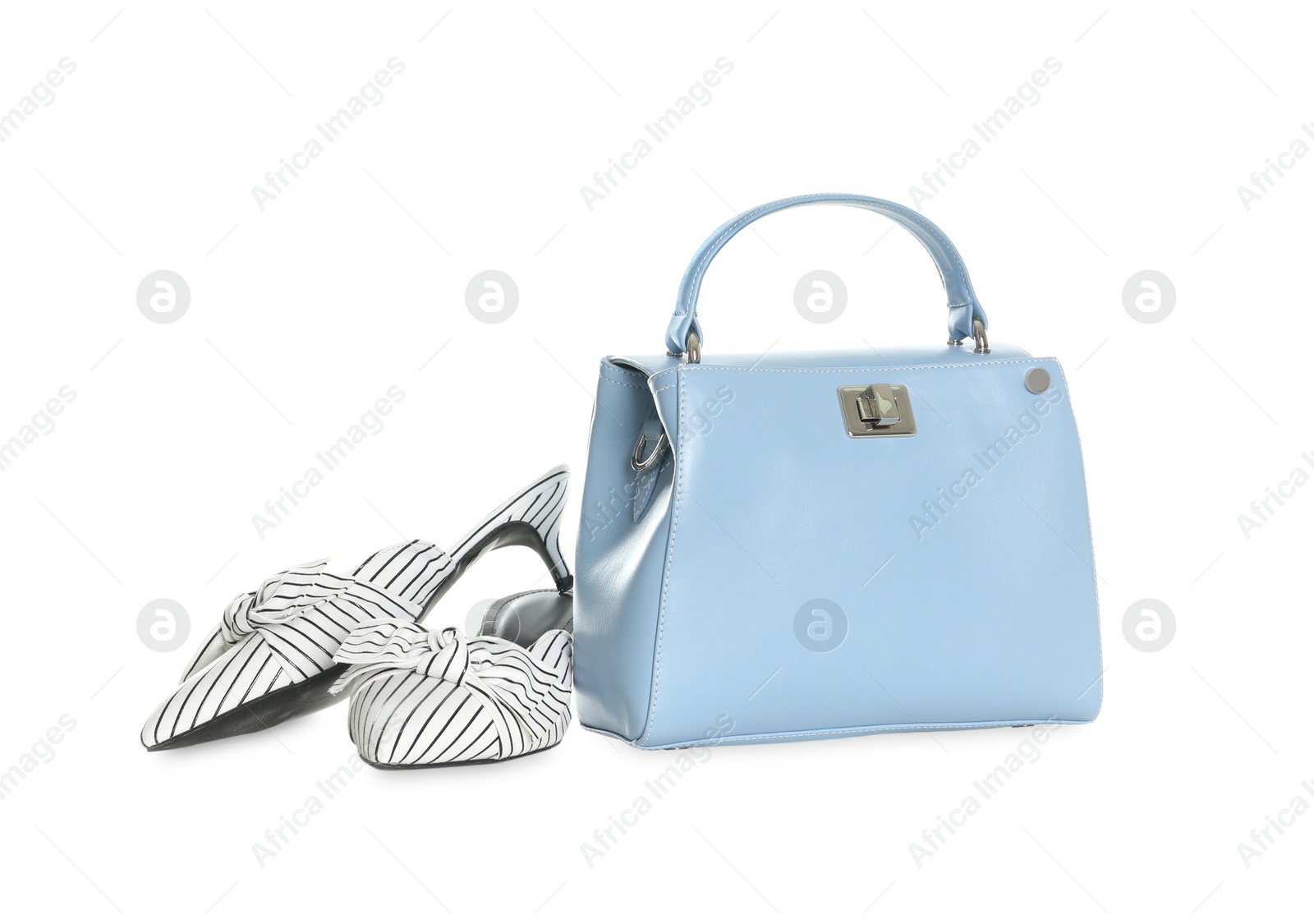 Photo of Stylish blue woman's bag and shoes isolated on white