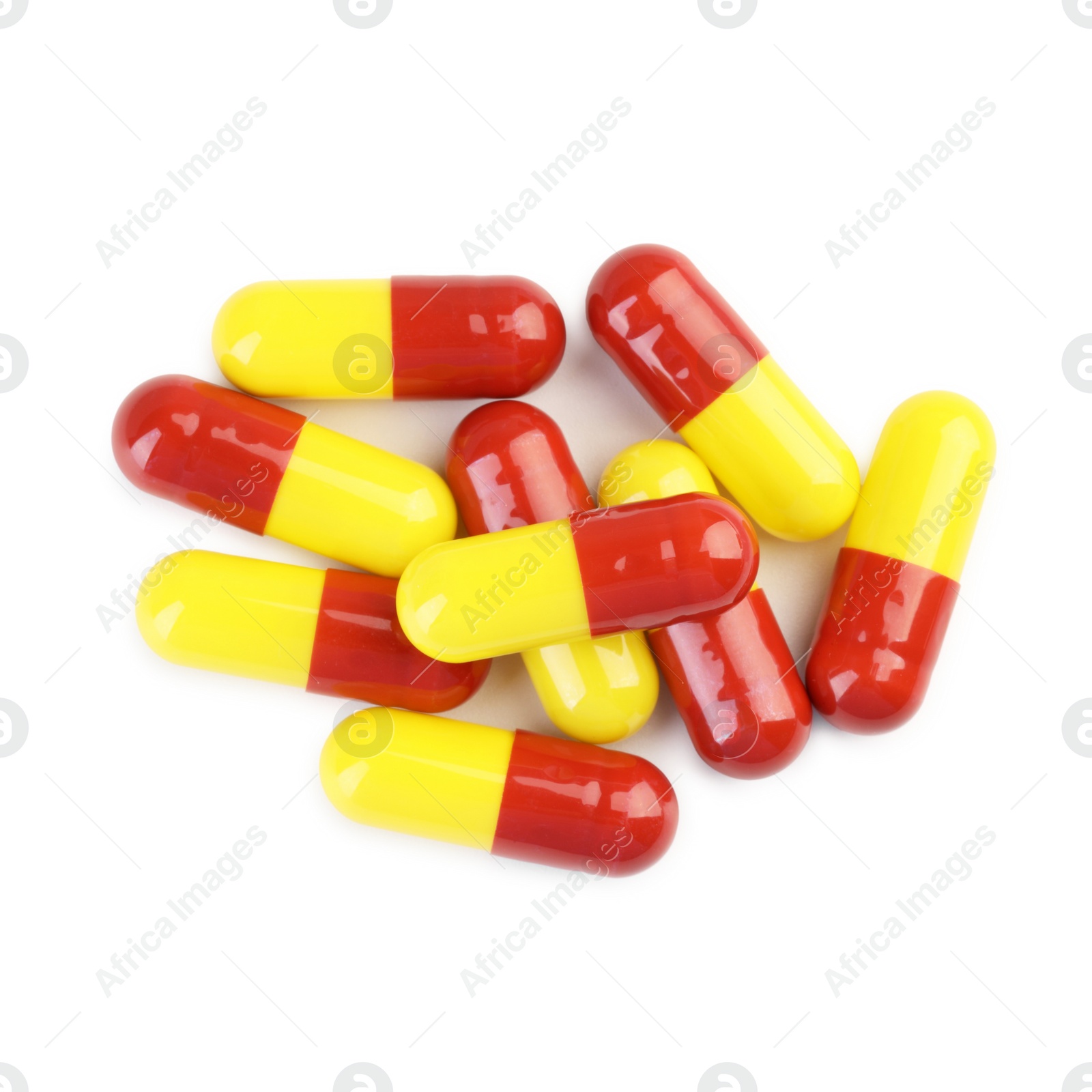 Photo of Many antibiotic pills isolated on white, top view