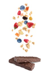Tasty chocolate glazed protein bars and granola with berries falling on white background