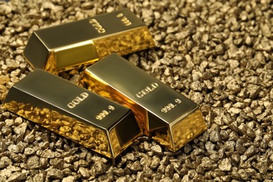 Photo of Many gold ingots on nuggets, closeup view