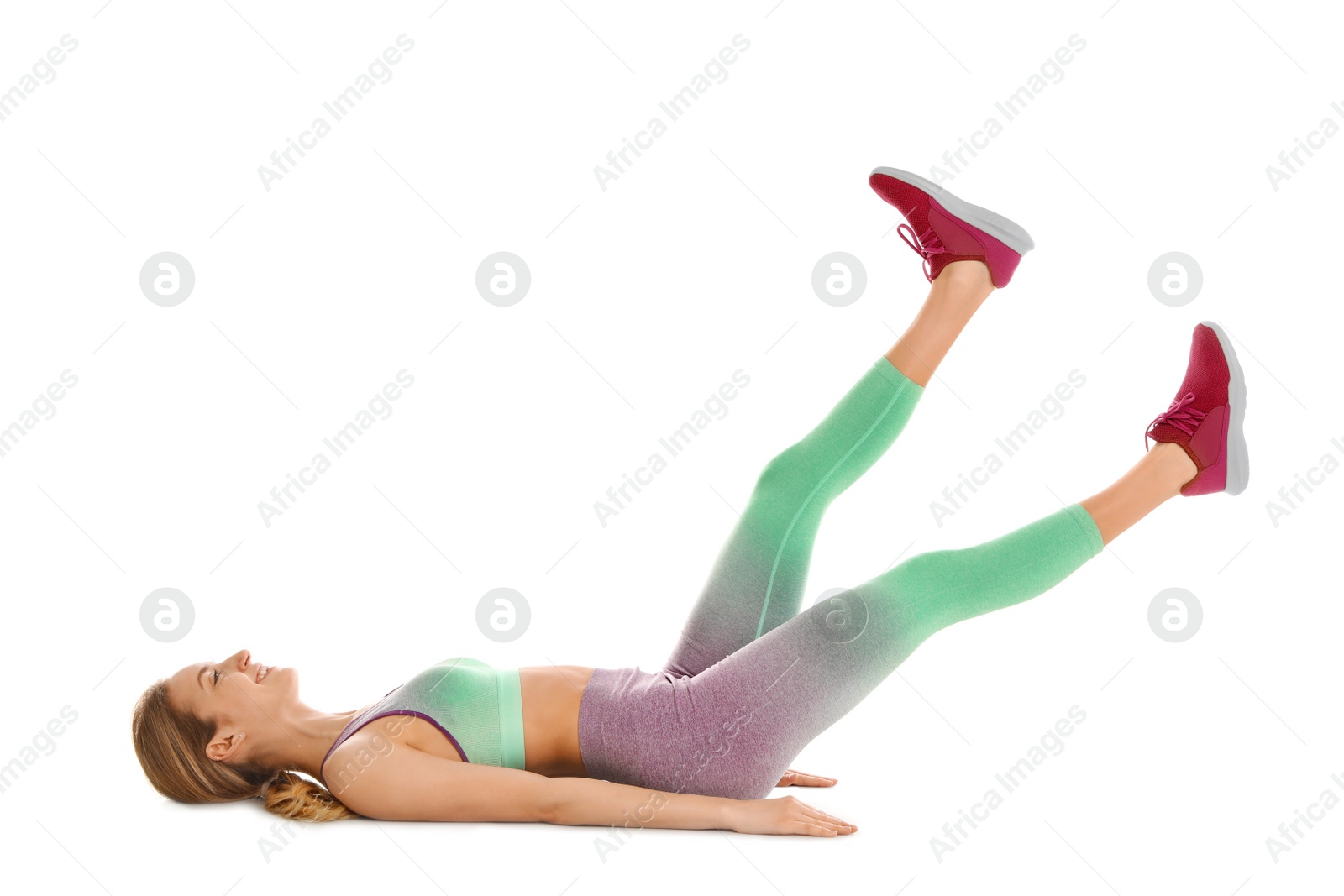 Photo of Young woman doing scissors exercise on white background