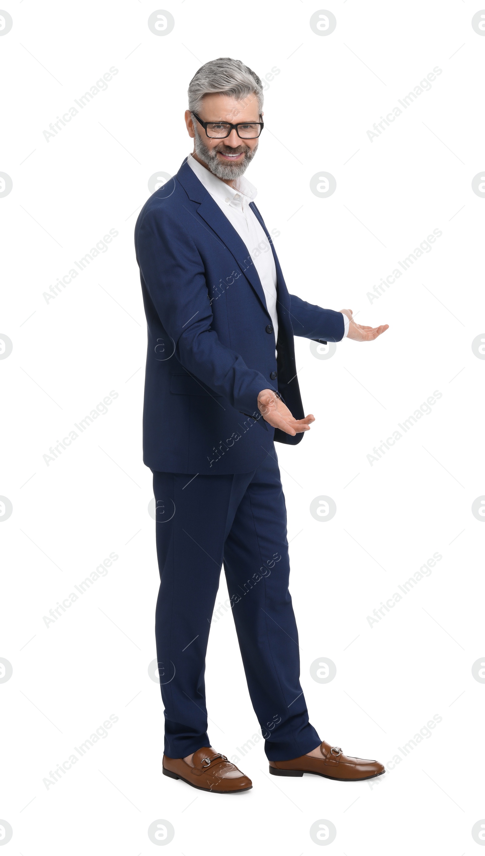 Photo of Mature businessman in stylish clothes posing on white background