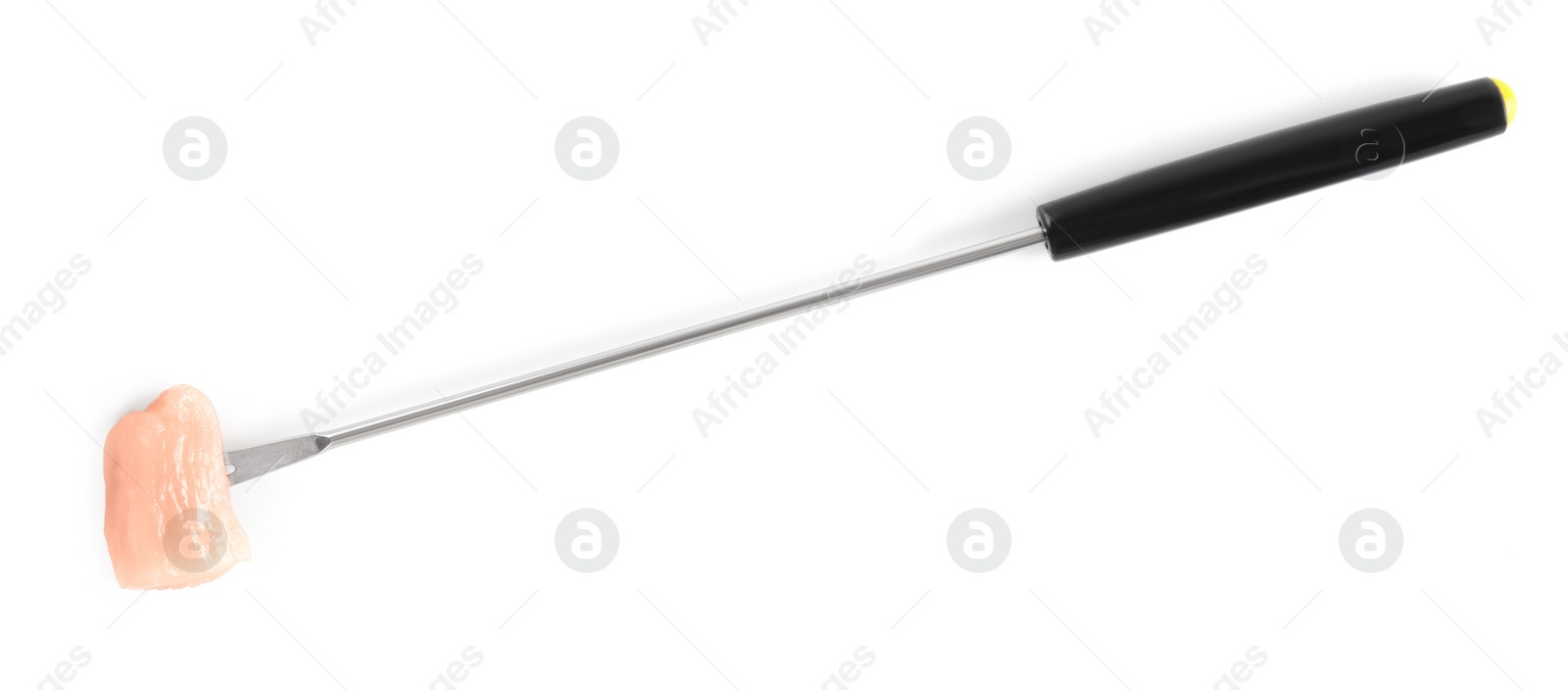 Photo of Fondue fork with piece of raw meat isolated on white, top view