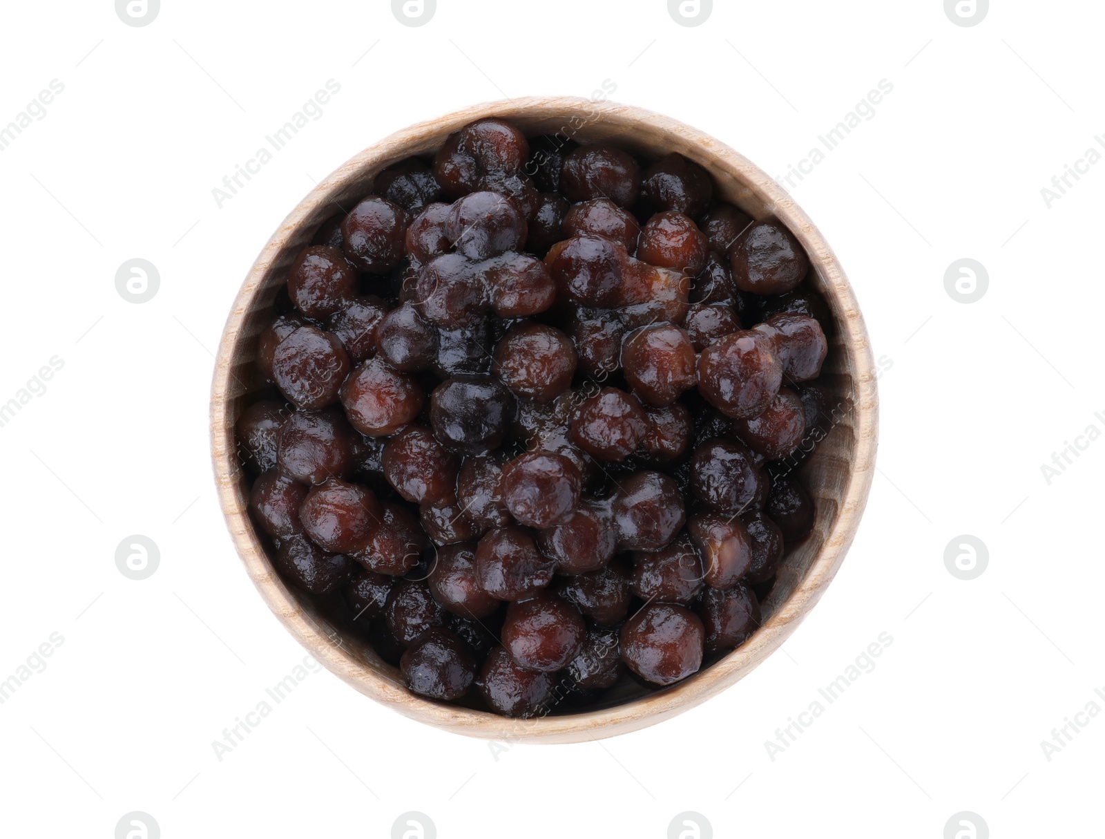 Photo of Tapioca balls for milk bubble tea in bowl isolated on white, top view