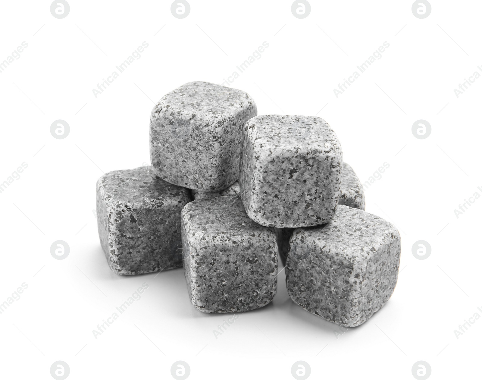 Photo of Classic grey whiskey stones on white background