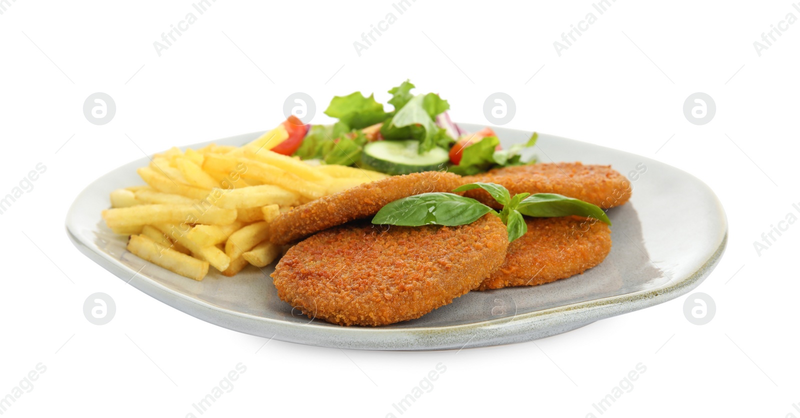Photo of Plate of delicious fried breaded cutlets with garnish isolated on white